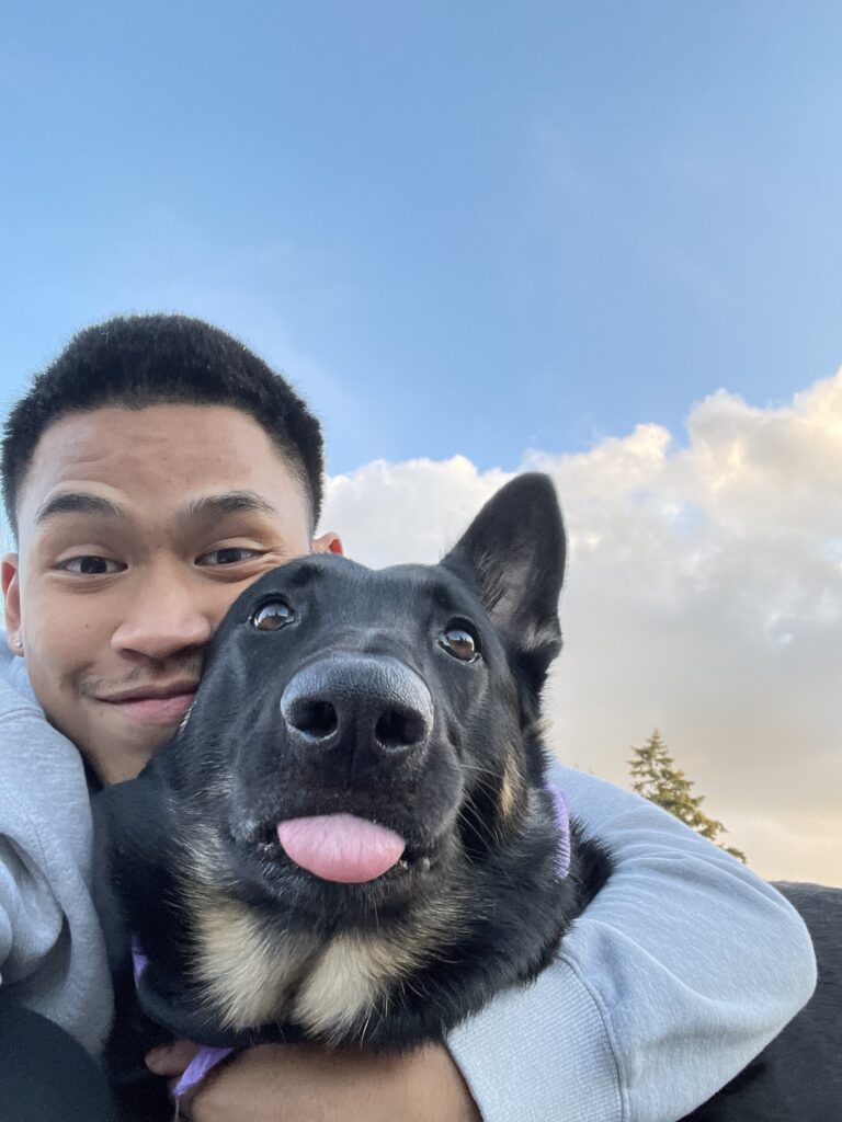 marc munoz posing with his dog, lilo